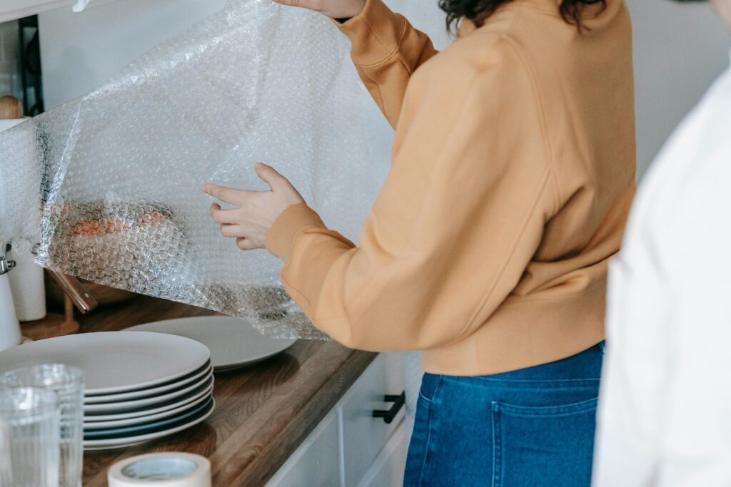 Packing the kitchen for move with forethought, caution, and care.